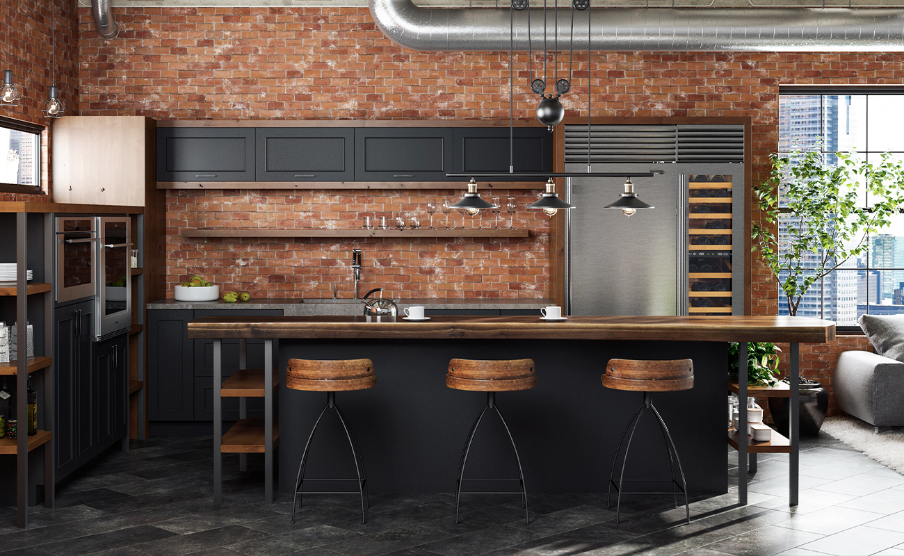 A beautiful industrial style kitchen design with black painted and medium wood stained cabinets in an urban loft home.