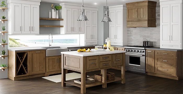 A gorgeous semi-custom and custom oceanside kitchen featuring traditional overlay cosntruction cabinet doors with framed cabinets from Dura Supreme's Crestwood Cabinetry product line. White painted cabinets are contrasted by medium to ight stained true brown wood cabinets and kitchen island. A window backsplash delivers light into the room and provides a beautiful view of the beach.