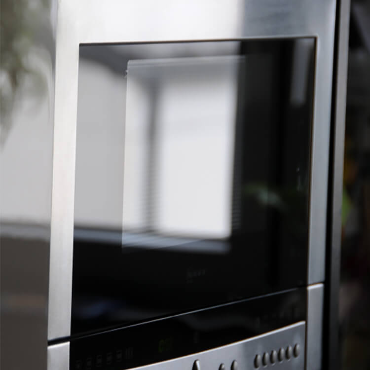 Close up of a modern day microwave. History of Kitchen Design and Where should the microwave go?
