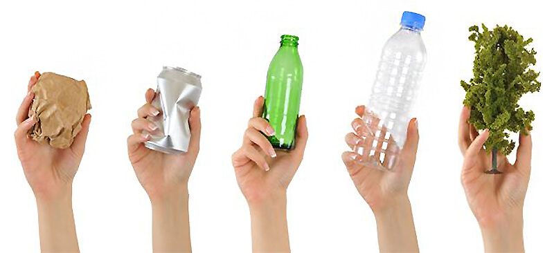 Three hands each holding up a recyclable material; an aluminum can, a glass bottle, and a plastic bottle.