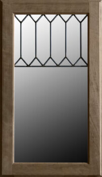 Dura Supreme's LG-52 leaded glass cabinet insert features an stunning tall pane with a pattern of tall hexagons at the top of the design.