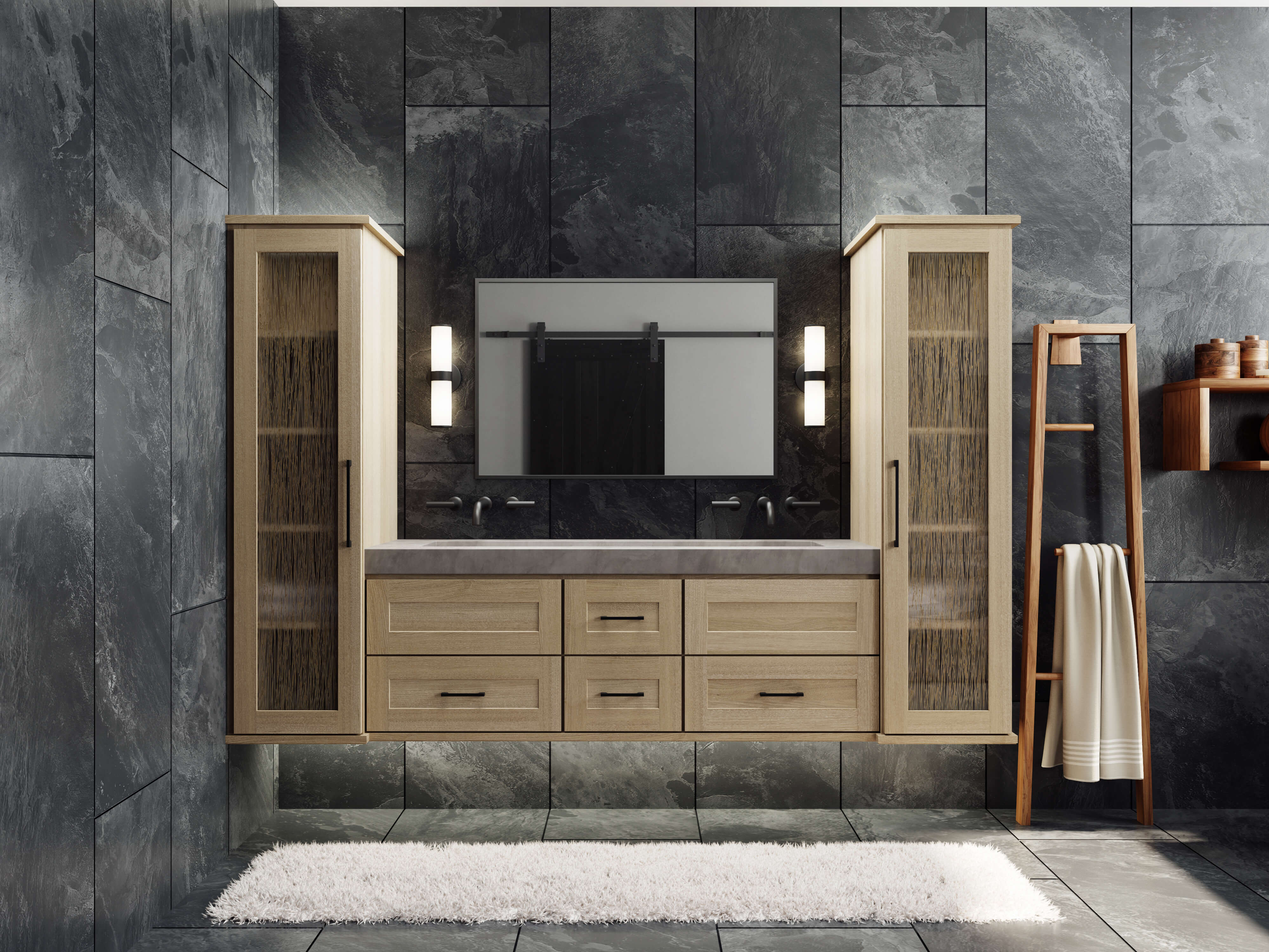 A floating vanity in a contemporary bathroom with a shallow shaker door style in a light raw quarter-sawn white oak color. Two tall floating linen cabinets flank each side of the vanity.