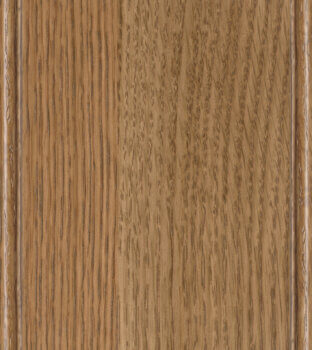 This finish color for Quarter-Sawn White Oak kitchen & bath cabinets is shown in the warm Toast stain by Dura Supreme Cabinetry. A medium cabinet color with a natural, true-brown undertone.