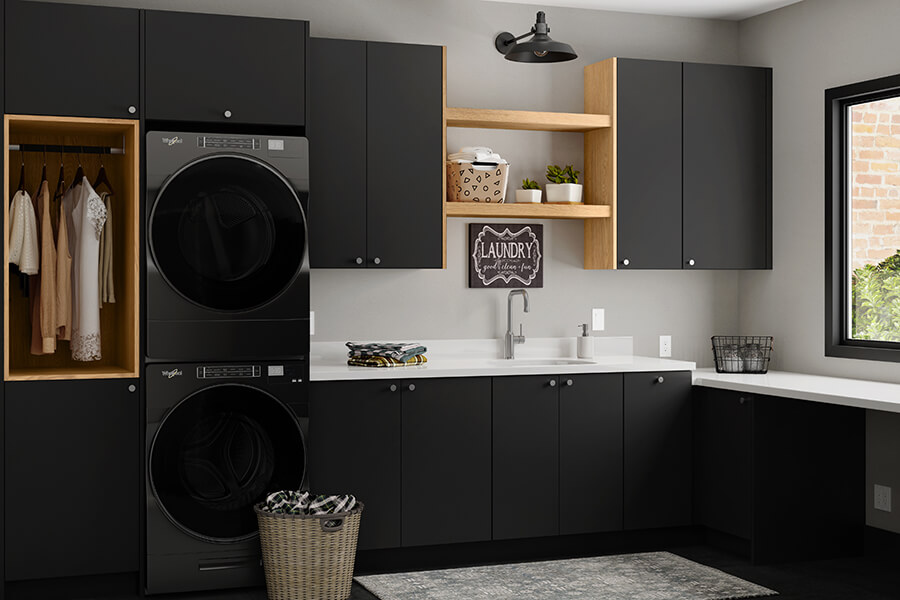 A Scandi style laundry room with Black matte cabinets using frameless construction.