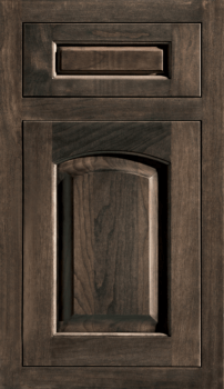 Dura Supreme's Hampton Classic Inset door has an arched raised panel that works great for classic and traditional styles. Show in a dark stain on cherry wood.